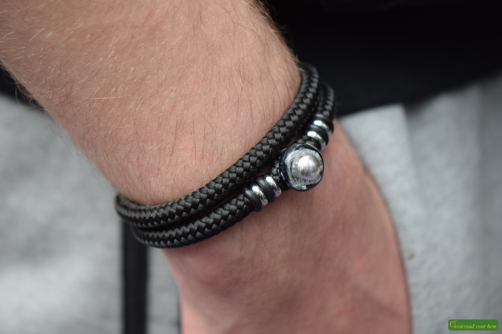 Men’s memorial bracelet worn double on wrist with glass bead and stainless-steel accents.