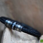 Men’s memorial bracelet in black sailrope with cremation ashes in stainless-steel bead and black clasp.
