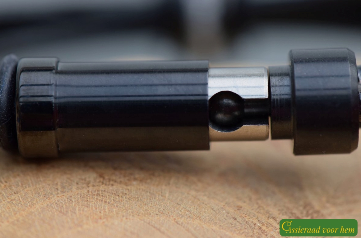 Detail of black stainless-steel slide clasp on marbled black-and-white men’s memorial bracelet.