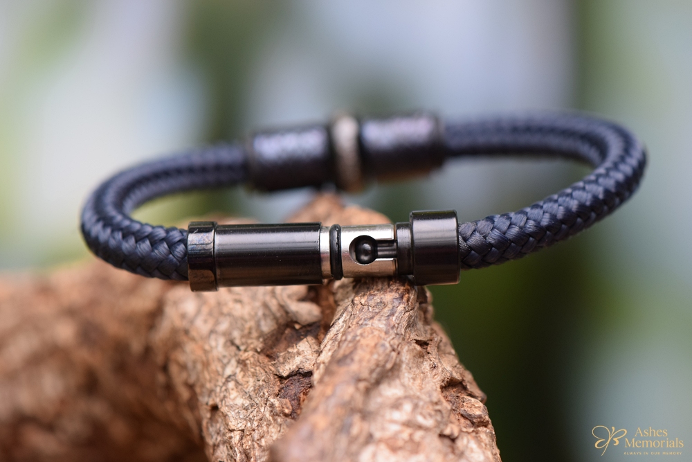 Back side of bracelet with black stainless-steel cup-cone sliding clasp.