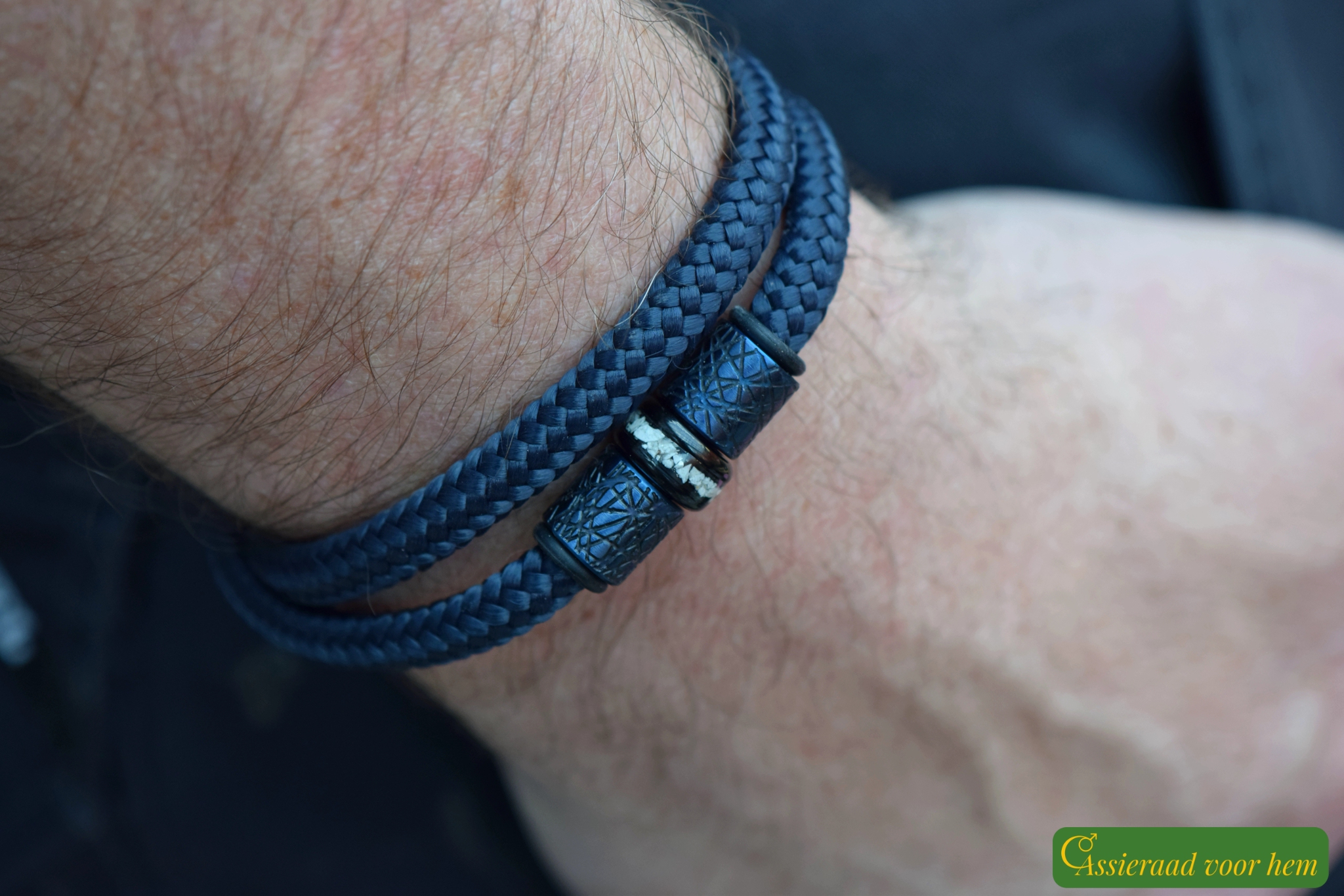 Close-up of black stainless-steel cup-and-cone slide clasp on men’s memorial bracelet