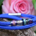 Men’s memorial bracelet in electric blue sailrope with cremation ashes in blue metallic stainless-steel bead.