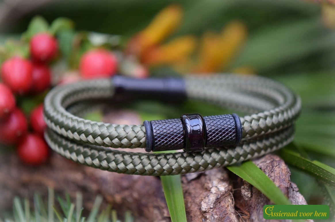 Men’s memorial bracelet in olive sailrope with stainless-steel ashes bead and black slide clasp.