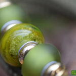 Men’s memorial bracelet with olive green glass bead containing cremation ashes