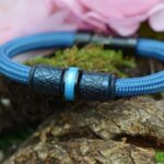 Front view of petrol sailrope men’s memorial bracelet with ashes in stainless-steel bead.