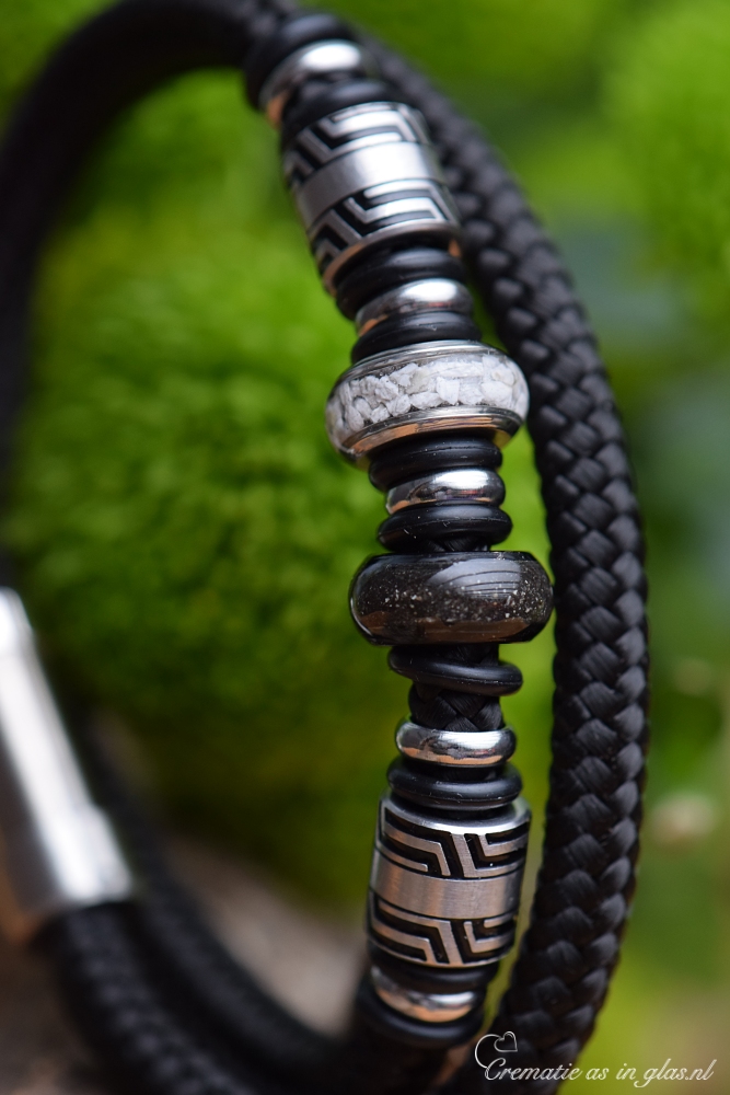 Detail view of double sailrope bracelet showing ashes set in silver stainless-steel bead.