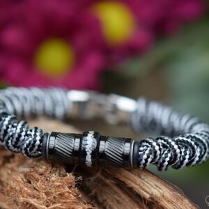 Men’s memorial bracelet made from black-white paracord with black design beads