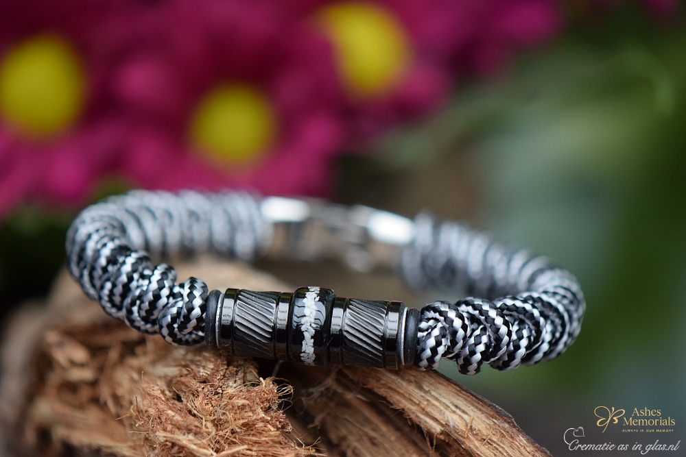 Men’s memorial bracelet made from black-white paracord with black design beads