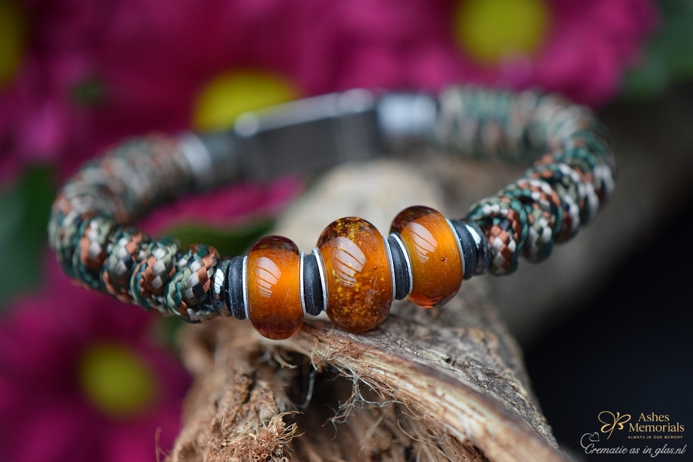 Men’s memorial bracelet with woodland camo knotwork and three transparent amber glass beads