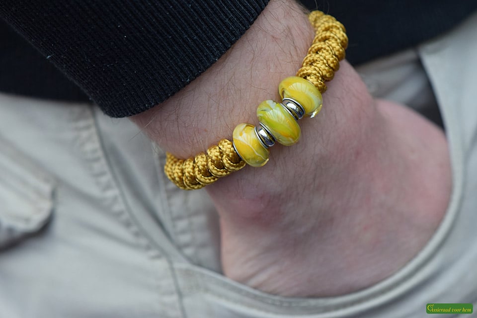 Men’s memorial bracelet in yellow Sailrope with stainless steel adjustable clasp shown in close-up.