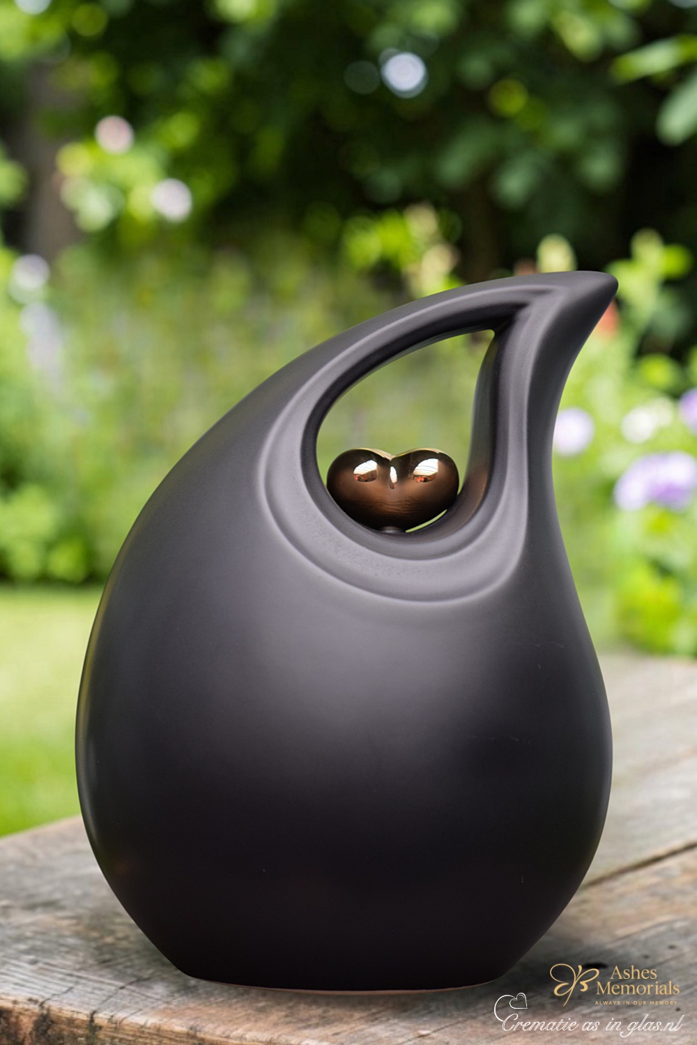 Back side of black ceramic memorial urn 3.8 liter with modern matte finish and curved design.